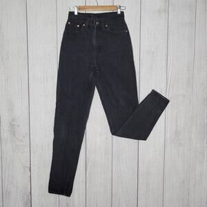 Vintage 1995 Levi's 521 Tapered Leg Faded Black Jeans, size 6 Long (25.5x32)